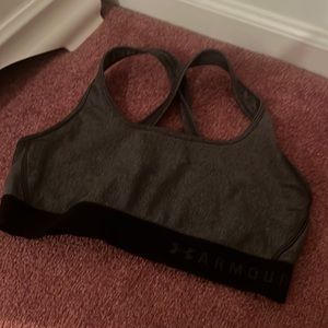 Grey underarmour, racerback sports bra with black elastic band